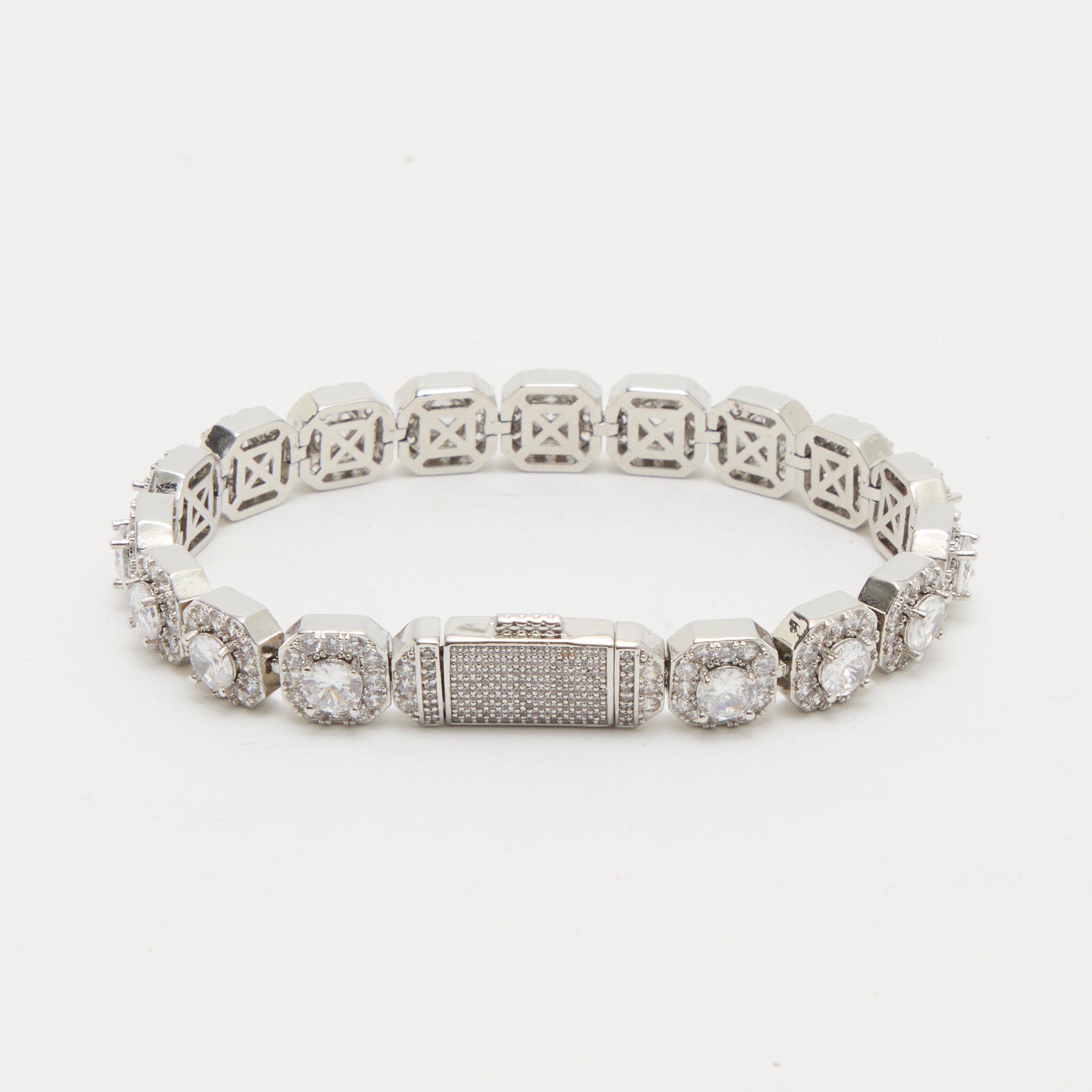 Silver bracelet with gemstones on a white background