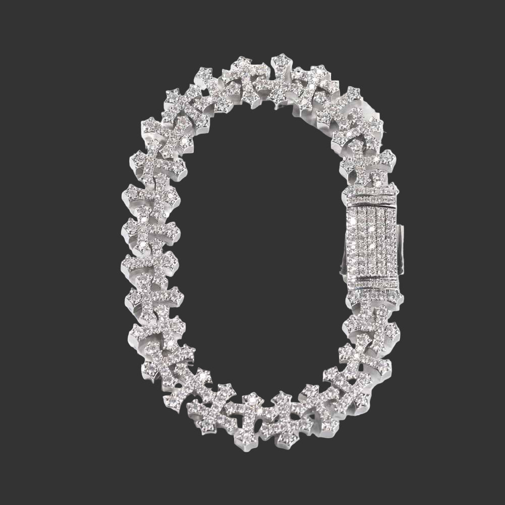 Silver bracelet with clear gemstones on a white background