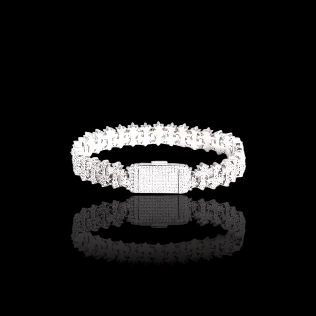 Silver ring with clear stones on a black background