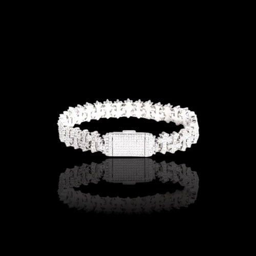 Silver ring with clear stones on a black background