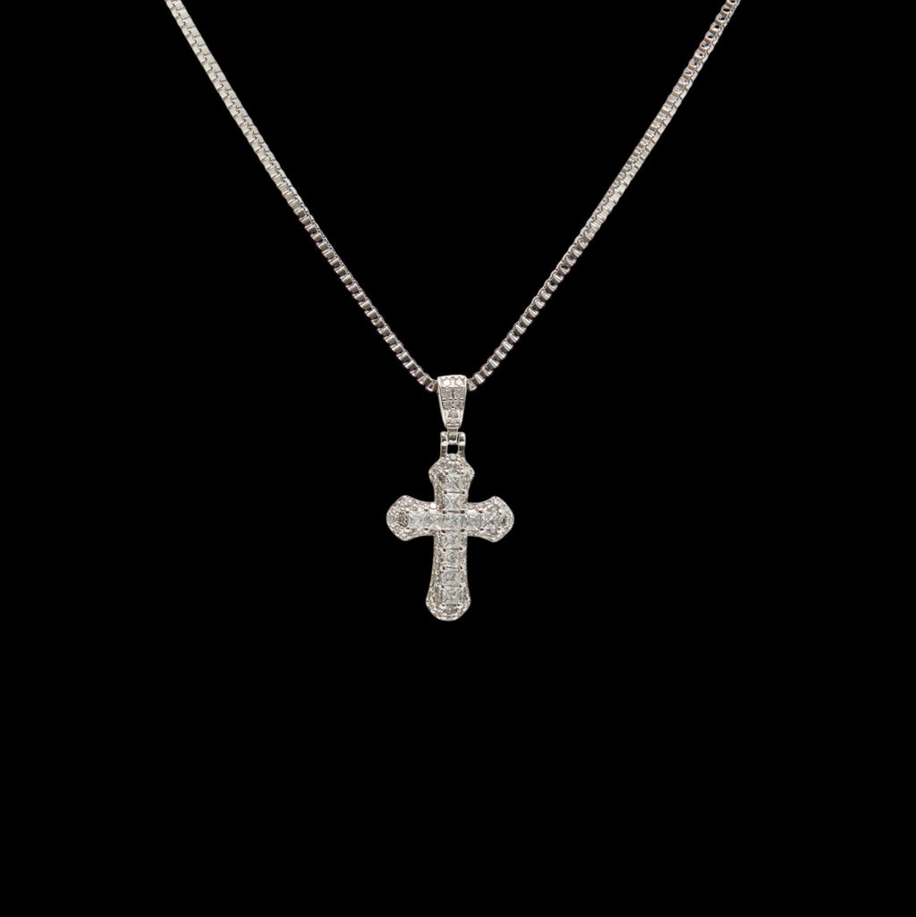 Silver cross pendant necklace on a black background