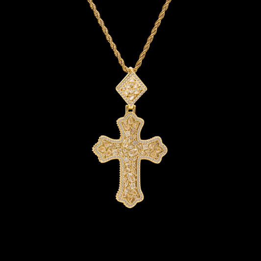 Gold cross pendant necklace on a black background