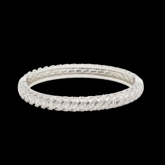 Silver bracelet on a black background