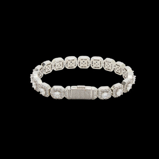 Silver bracelet with clear stones on a black background