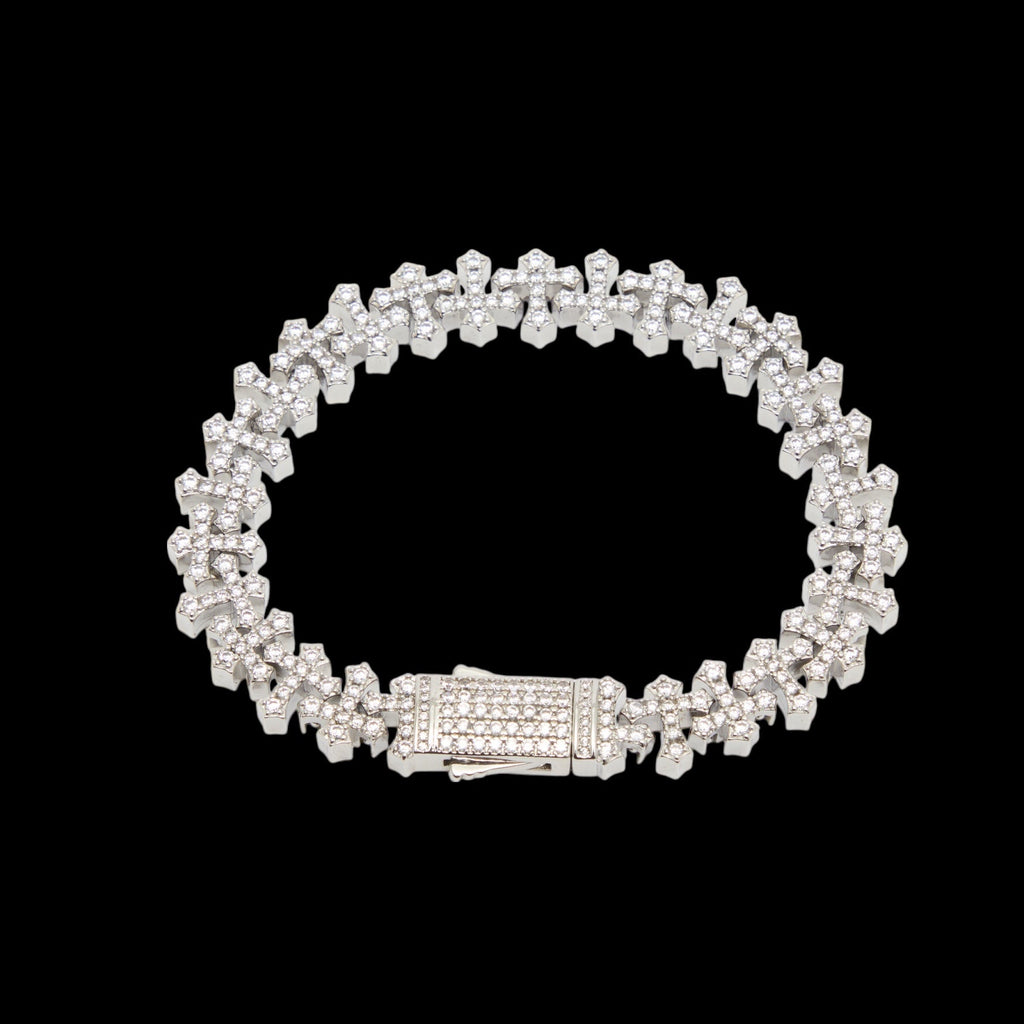 Silver bracelet with clear stones on a black background