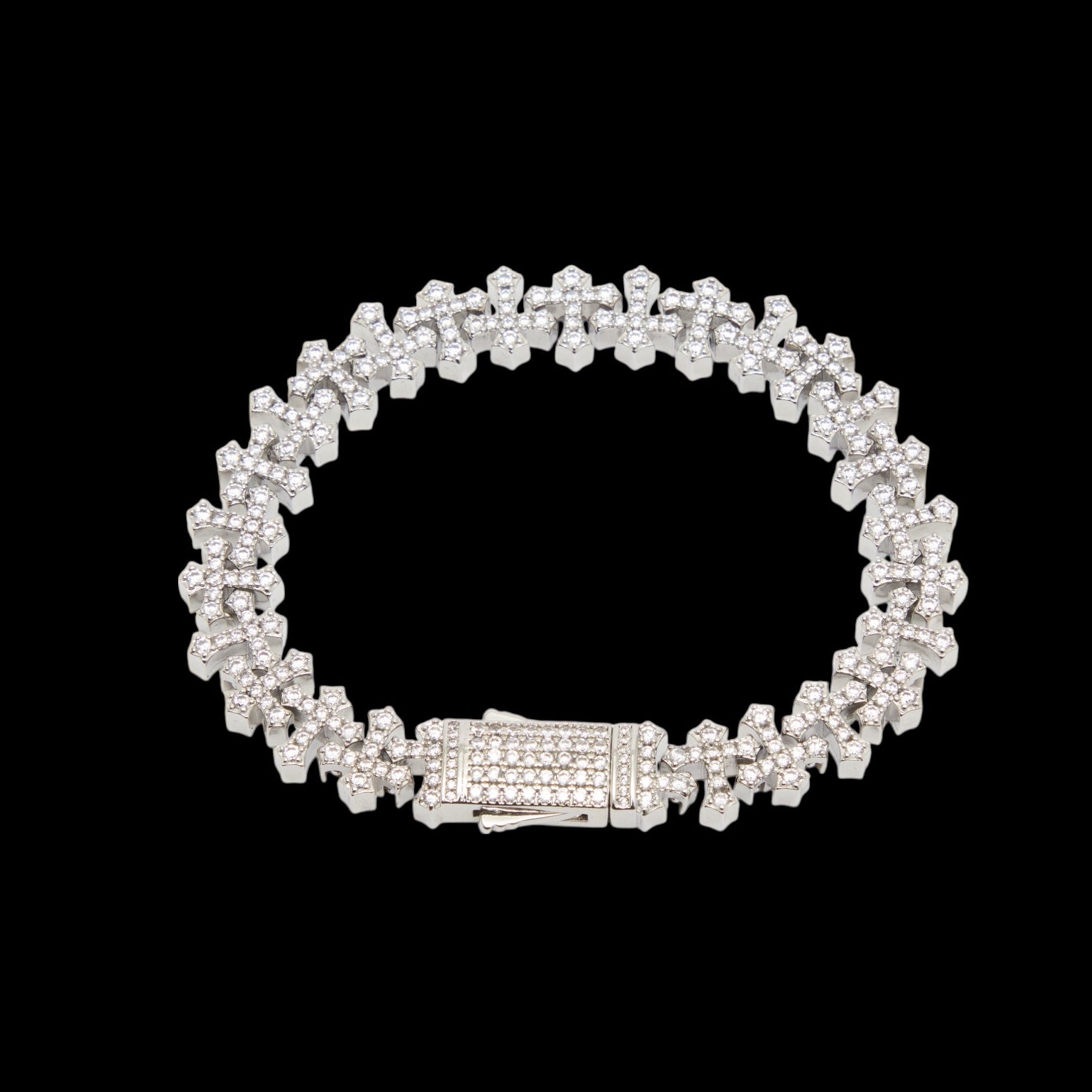 Silver bracelet with clear stones on a black background